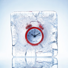 Frozen red alarm clock