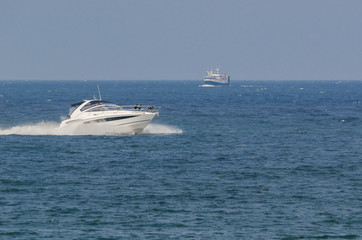 Obraz premium MOTOR BOAT - Fast boat on a cruise on the sea