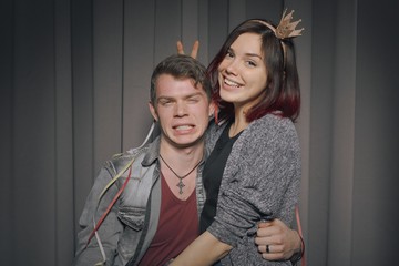 Happy couple in a photo booth
