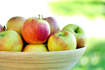 Organic apples in basket. Close up view.