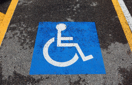 reserved parking car with wheelchair symbol