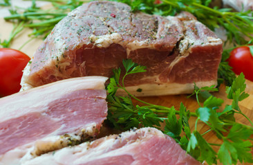 Pork pieces are salted in the traditional way.