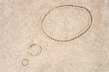 Fototapeta na wymiar speech bubble drawing in sand