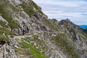 Narrow mountain trail above Innsbruck in Austria during the daytime