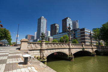 Obraz premium Regentessebrug bridge on skyscrapers background , Rotterdam