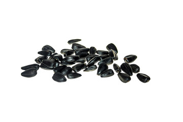 Black sunflower seeds on a white background