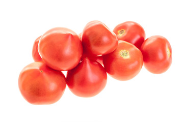 Pile of delicious tomatoes, isolated on white, close up