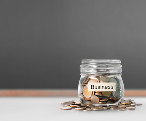 Silver coins in piggy bank Glass