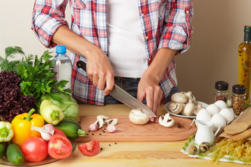 Woman cook at the kitchen
