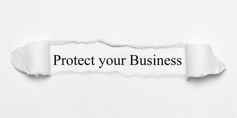 Protect your Business on white torn paper