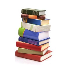 Stack of books on white background