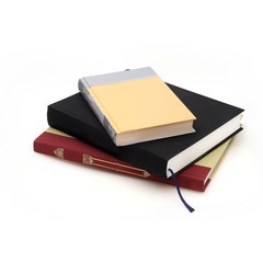 Stack of books on white background