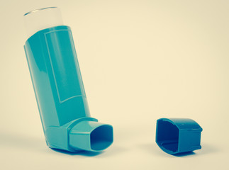 Asthma inhaler isolated on white.