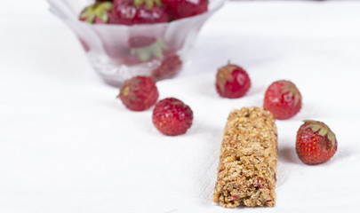 Crunchy rice bar with strawberry isolated on white