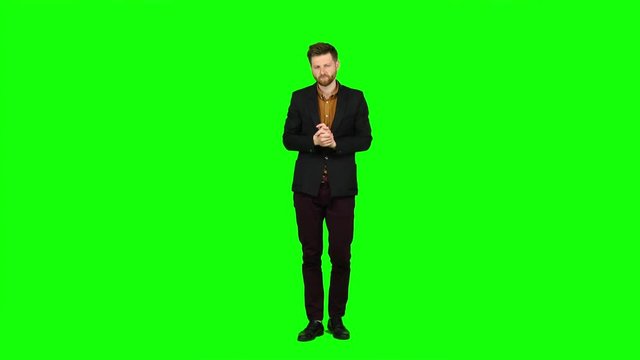 Sleeps a man, yawns, he is sleepy and wants to go to bed. Green screen