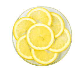 Delicious slices of lemon in plate, isolated on white