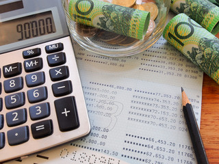 Australia banknotes ,calculator and book bank for save money concept.