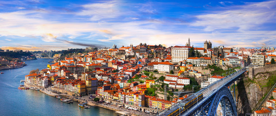 panorama of beautiful Porto over sunset - view with famous bridge of Luis, Portugal - obrazy, fototapety, plakaty