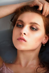 Porter is a beautiful red-haired girl with beautiful . Natural beauty, natural hair color.Ginger, in a milk bath
