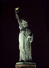 Statue of Liberty at night © eddie toro