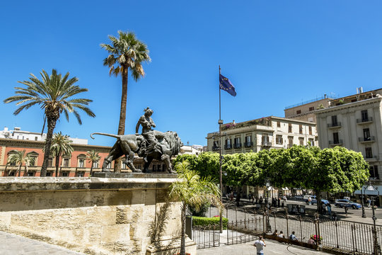 A view of the Piazza Verdi and the Teatro Massimo in Palermo . Sicily