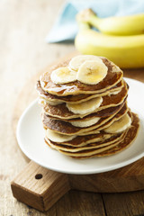 Banana pancakes on a white plate