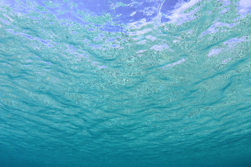 Underwater ocean background with clear bue water