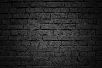 Old brick wall, black background texture