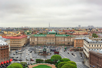 Fototapeta na wymiar View from the colonnade of St. Isaac's Cathedral in cloudy day, St.Petersburg, panoramic cityscape