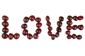 Love word with red cherries isolated on white background