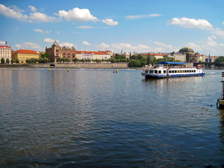 Fototapeta na wymiar River vitava, ferry on the river, Prague