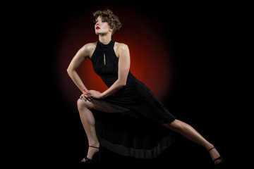 Fototapeta na wymiar girl dancer in tango dress