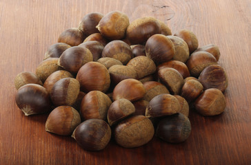 chestnuts on wooden  background