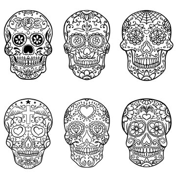 Set of hand drawn sugar skulls. Day of the Dead. Dia de los Muertos. Vector illustration