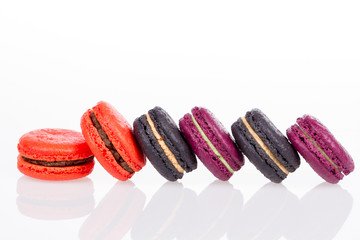Sweet and colourful french macaroons or macaron on white background, Dessert.