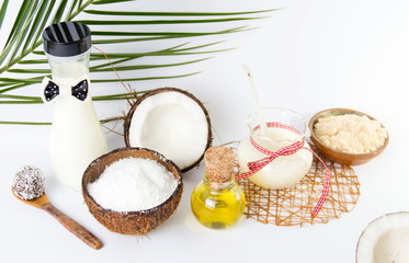 Various coconut products collection on white