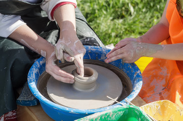 Master class on pottery / Photo taken in Russia, in the city of Orenburg, at the fair of the festival of historical reconstruction 