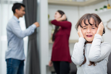 Frustrated of little girl is disaster in argument of mother and father in family conflict