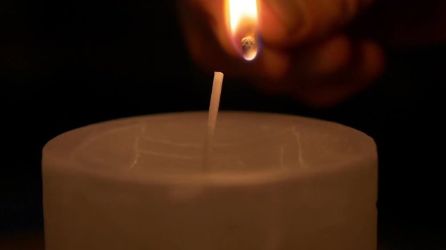 Match Lighting a Candle
