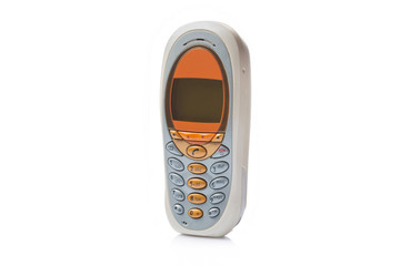 Old retro mobile phone isolated on white background