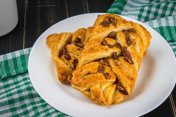 Danish pastry maple pecan with nuts and maple syrup