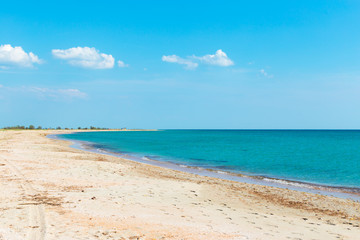 Tropical beach with sand, summer holiday background.