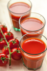 Tomato juice and fresh tomatoes