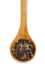set of peppercorn in wooden spoon isolated
