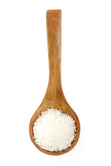 ground coconut in wooden spoon isolated