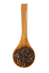 cloves in wooden spoon isolated