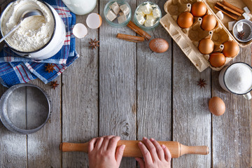 Baking ingredients on rustic wood background