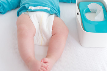 Little baby boy preparing for a diaper change