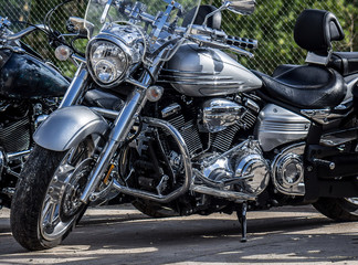 Motobikes in the street in the parking lot
