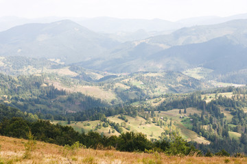 Fototapeta premium Mountain landscape with hills and forests